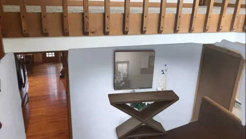 Blue-gray walls with dark furniture
