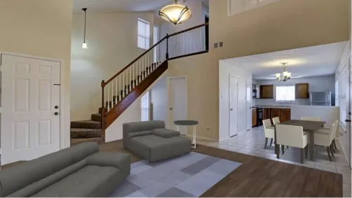 Living room with area rugs dining room table