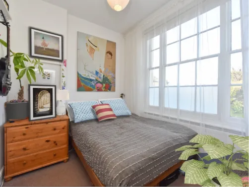 tiny bedroom full of character 