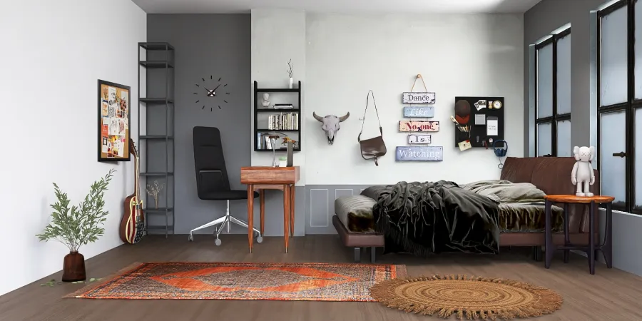 a living room with a bed, chair, and a desk 