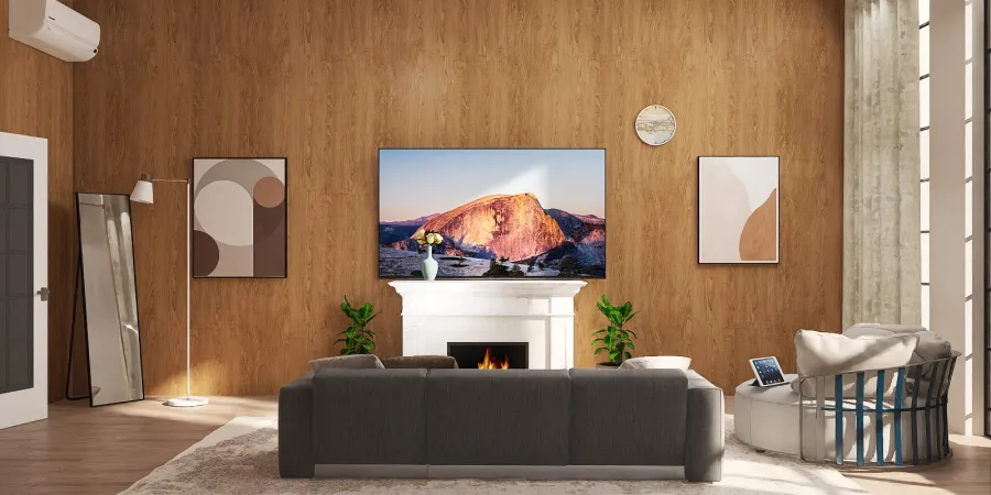 a living room with a couch, tv and a fireplace 