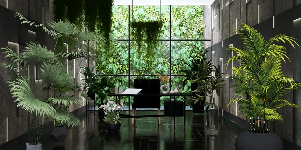 a desk with a computer and a plant in the middle 