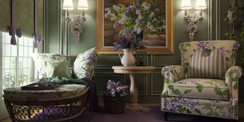Floral upholstered chairs arranged in a cozy reading nook with a small table, designed in a vintage style to create a warm and inviting interior space; features Homestyler's real-time 3D rendering for quick design previews.