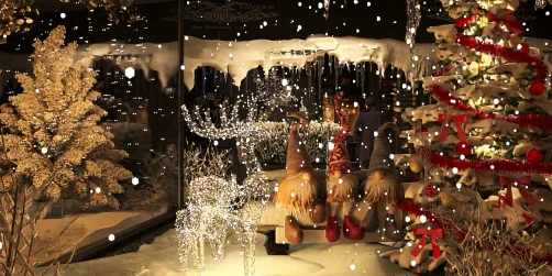 Christmas scene with decorated tree and snow-covered surroundings featuring a cozy seating area in a festive style, capturing a warm holiday atmosphere using Homestyler's real-time 3D rendering for interior design.