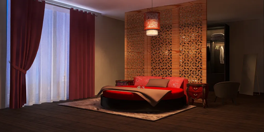 a bed room with a red bedspread and a lamp 