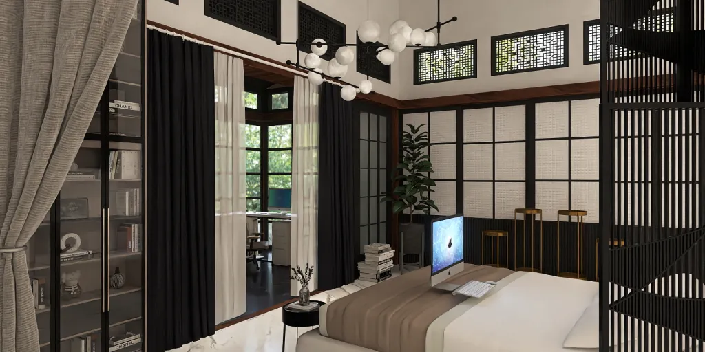 a bedroom with a bed and a desk with a laptop 
