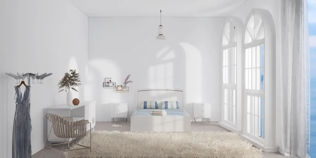 a living room with a white couch and a window 