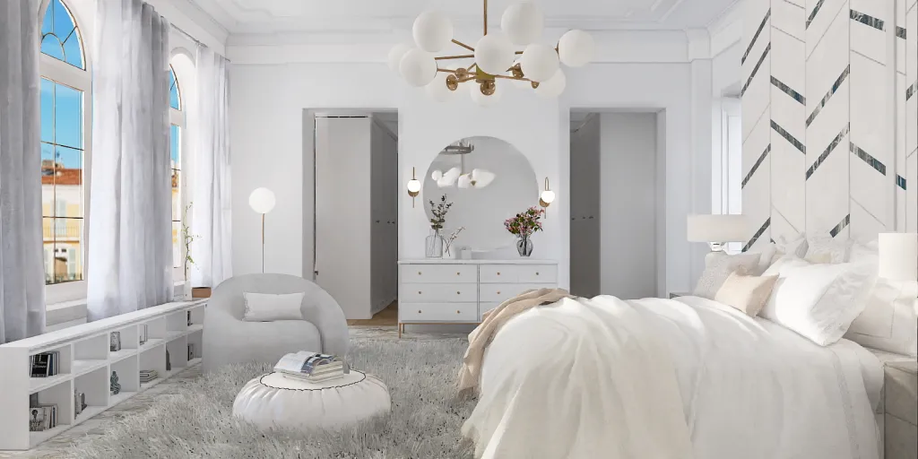 a bedroom with a white bed and white walls 