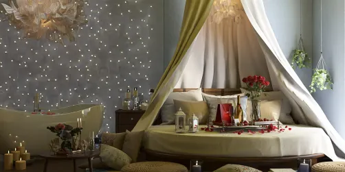 cozy bedroom with a canopied bed adorned with flowers and candles, designed in a romantic style, showcasing an inviting ambiance for relaxation and comfort, utilizing Homestyler's 3D rendering feature.