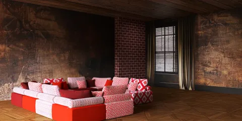 a modern sectional sofa arranged in a cozy living room style with rustic charm, showcasing Homestyler's real-time 3D rendering feature.