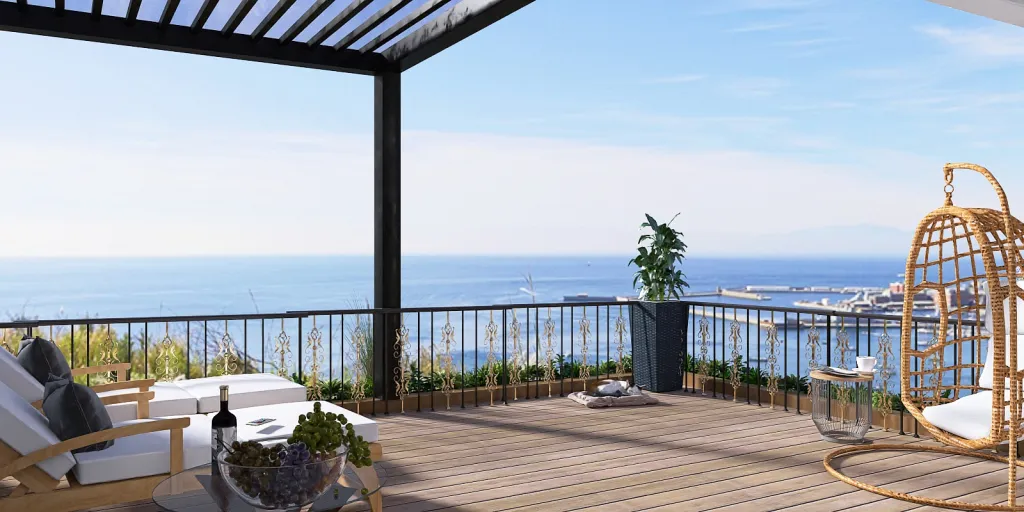 a patio with a balcony overlooking a beach 
