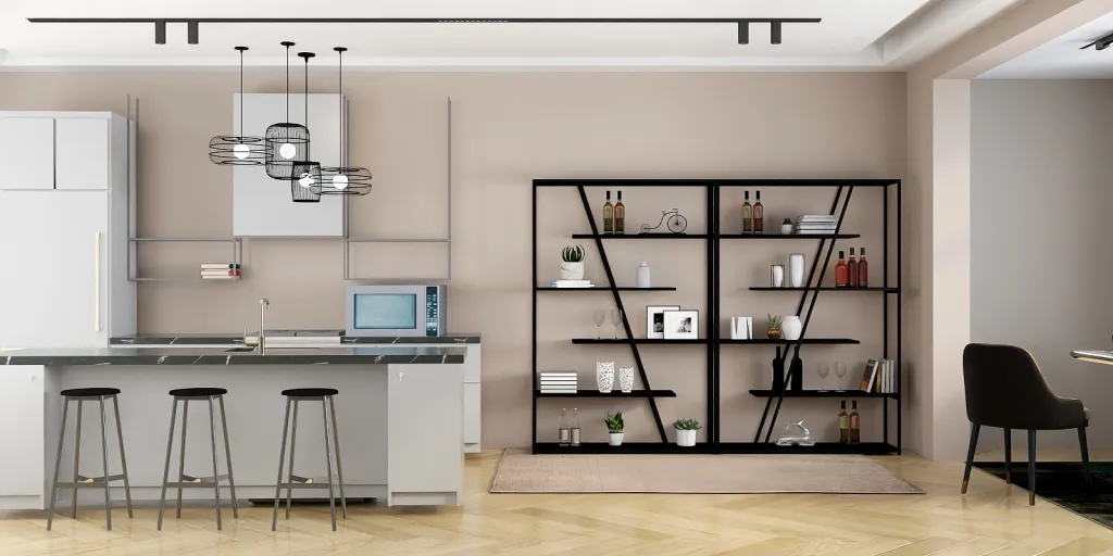 a kitchen with a desk and a computer 