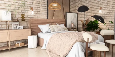 Cozy bedroom design featuring a modern bed with soft linens, natural wood furniture arrangement, and a rustic brick wall, showcasing interior decor with an emphasis on comfort and style, utilizing the advanced real-time 3D rendering feature of Homestyler.
