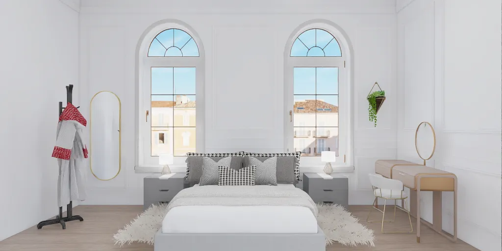a white bed with a white bedspread and a white chair 