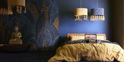 cozy bedroom with stylish wallpaper design featuring waves and decorative pendant lights, showcasing a serene atmosphere; perfect for maximizing space using Homestyler's real-time 3D rendering feature.