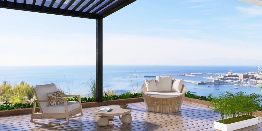a patio with chairs and a table with a view of the ocean 