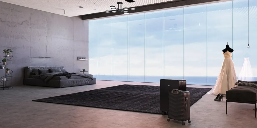a room with a couch, chair, and a large window 