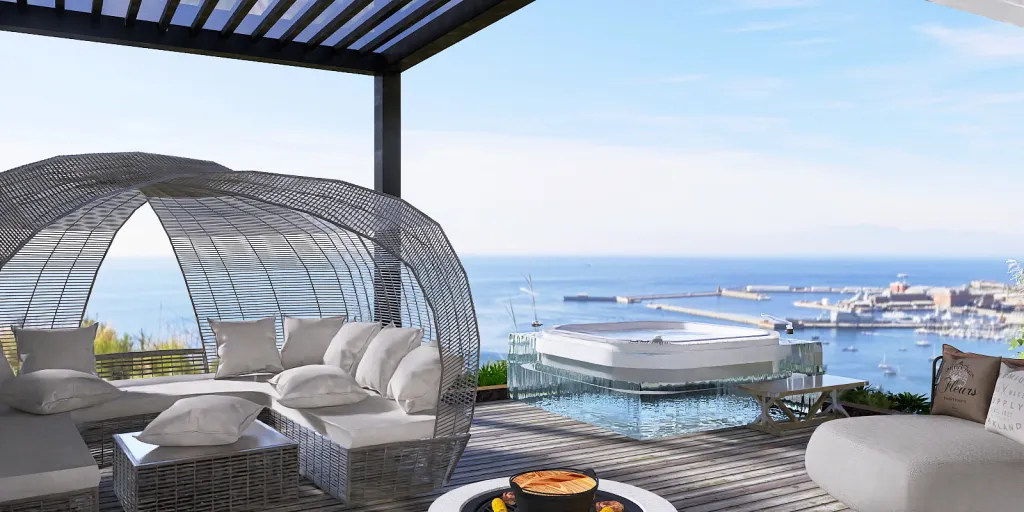 a large open balcony overlooking a beach with a view of the ocean 