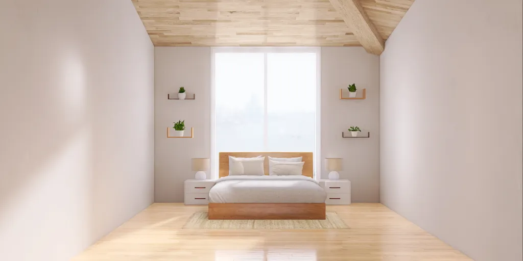 a bedroom with a bed, a chair, and a window 