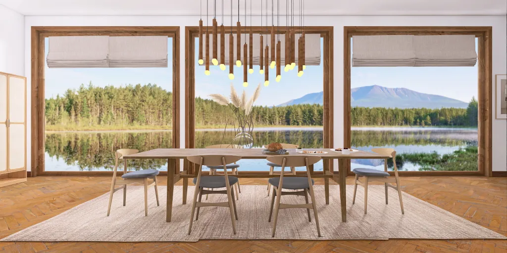 a dining room table with a view of the water 