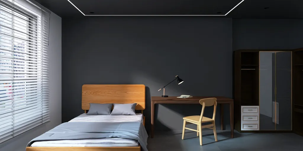 a bedroom with a bed, desk, and chair 