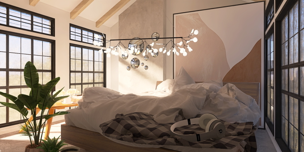 a bed with a blanket and a lamp in it 
