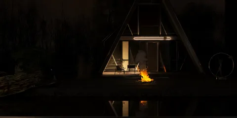 A modern A-frame house illuminated at night with outdoor seating and a fire pit in the foreground, showcasing a cozy ambiance and outdoor living space design; featuring Homestyler's real-time 3D rendering for efficient design proposals.