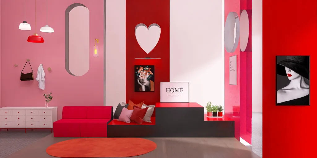 a red couch sitting in a room with a pink wall 