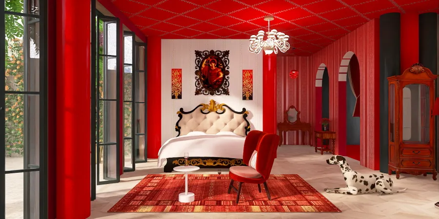 a red bed with a red blanket and a red chair 