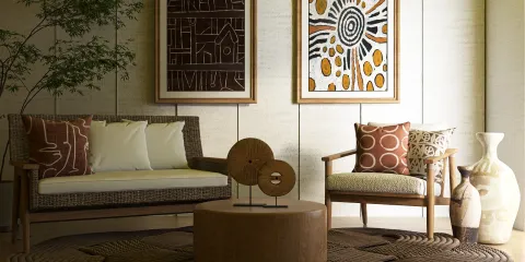 modern seating arrangement featuring a wooden sofa and armchair in a cozy living room, showcasing a contemporary style with artistic wall decor, ideal for interior decor inspiration, utilizing Homestyler's real-time 3D rendering feature.