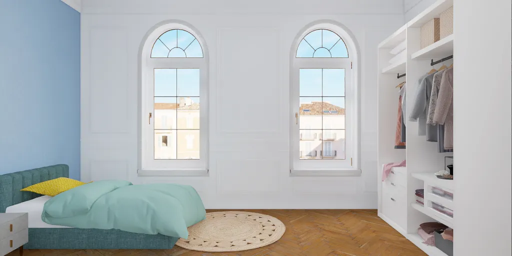 a bedroom with a bed, a rug, and a window 