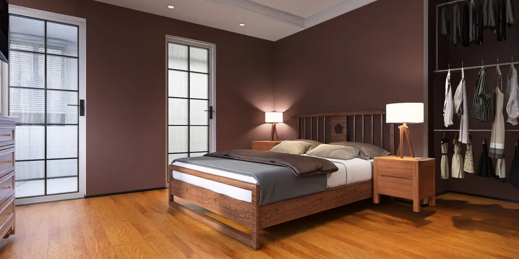 a bedroom with a bed, dresser, and a lamp 