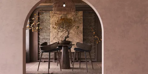 A modern dining area featuring stylish round chairs around a wooden table, showcasing a rustic-chic design aesthetic, enhancing the inviting atmosphere of the space with interior design elements, leveraging Homestyler's real-time 3D rendering capability.