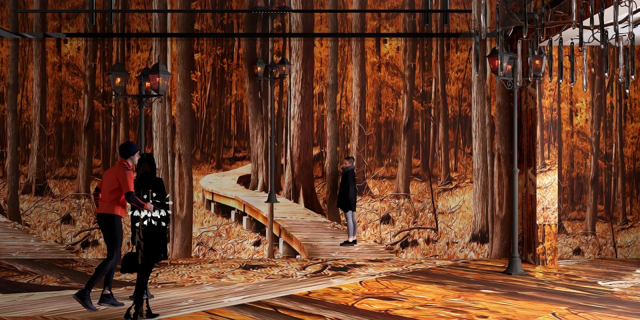 a woman walking across a wooden walkway 