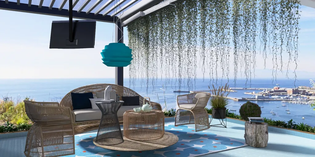 a patio with a view of the ocean and a balcony 