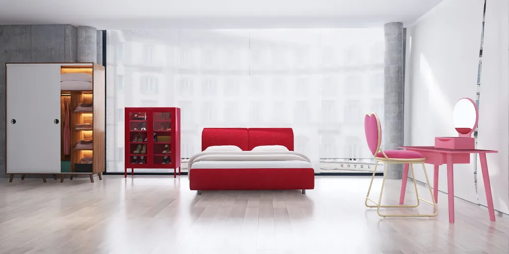 a red couch sitting in a room next to a red chair 