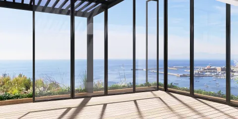 spacious room with large glass windows showcasing a stunning ocean view, designed for contemporary living, featuring Homestyler's real-time 3D rendering to visualize open space design.