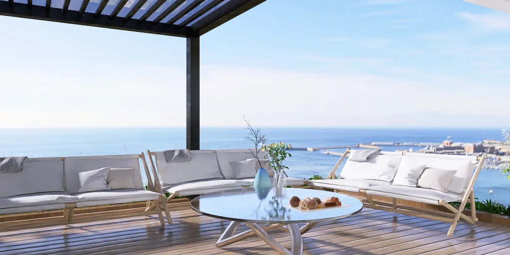 a dining room table with a balcony overlooking the ocean 
