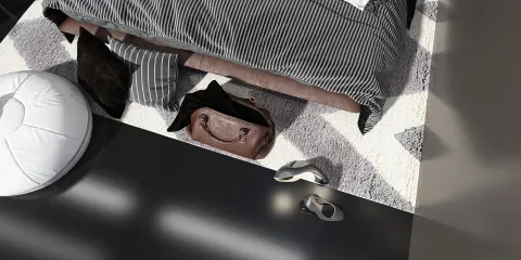 bedroom with bedding arrangement featuring striped patterns and decorative pillows, showcasing a modern minimalist style that emphasizes comfort and space efficiency using Homestyler's smart furniture layout feature.