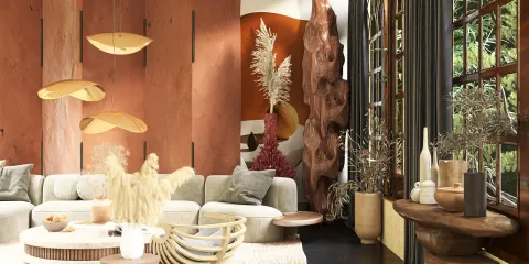 living room with a modern design featuring a cozy sofa and artistic decor elements, showcasing a warm color palette and natural materials, highlighting Homestyler's real-time 3D rendering feature for instant design previews.