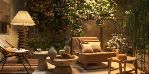 cozy garden seating area featuring a wooden lounge chair and round coffee table styled with natural decor and ambient lighting, creating a serene outdoor retreat; showcasing Homestyler's real-time 3D rendering for realistic design previews.